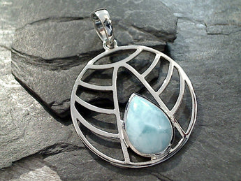 Larimar and sterling silver pendant measures around 2" tall with the bail by 1-1/2" wide at the max points and is mid to slightly heavier weight. Use a medium or thick gauge chain with this pendant. The color and pattern on the stone will vary slightly from the sample photos with each pendant.