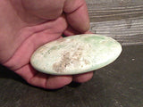 Caribbean Calcite 154g Palm Stone